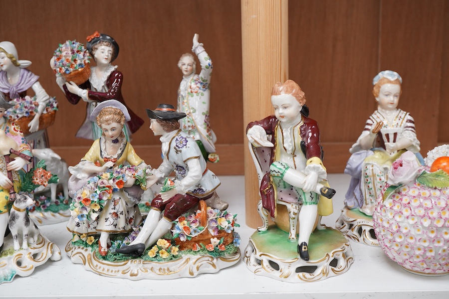 Four pairs of porcelain figures, a single figure and seated figure group, all after Chelsea and Derby originals, together with a Meissen style schneeballen porcelain sucrier and cover, (12)